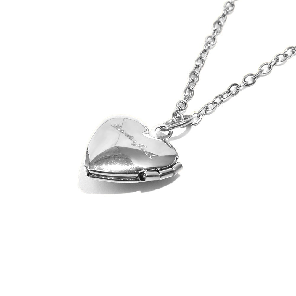 Tiana's White Heart Locket In Silver