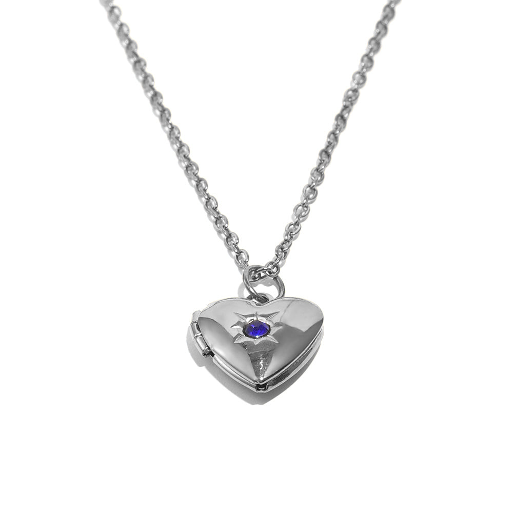 Tiana's Sapphire Blue Heart Locket In Silver