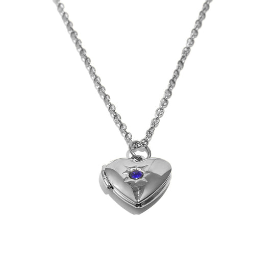Tiana's Sapphire Blue Heart Locket In Silver