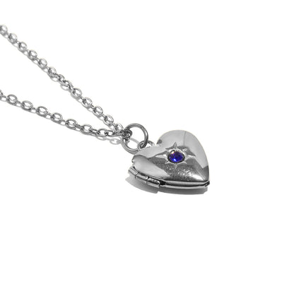 Tiana's Sapphire Blue Heart Locket In Silver
