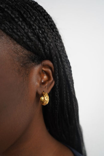 Maria's gold celestial earrings