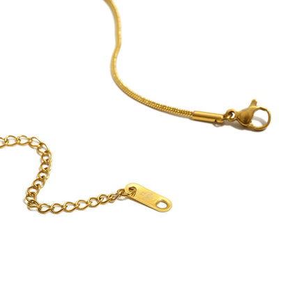 Thalia’s gemstone pendant