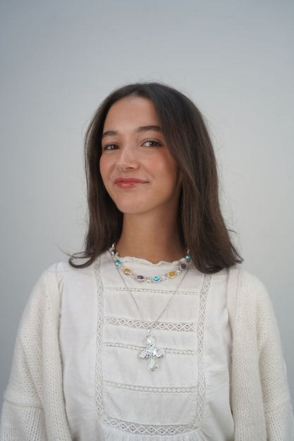 Daisy's silver cross necklaces